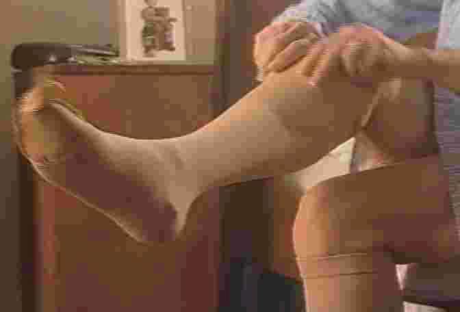 This woman is donning doctor-approved compression stockings. 